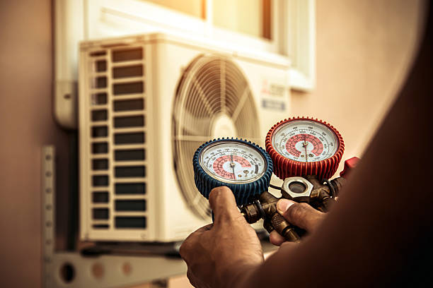 Professional Heat Pump Repair technician working in Rehoboth Beach, DE